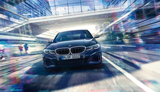 BMW with motion blur showing it's speed